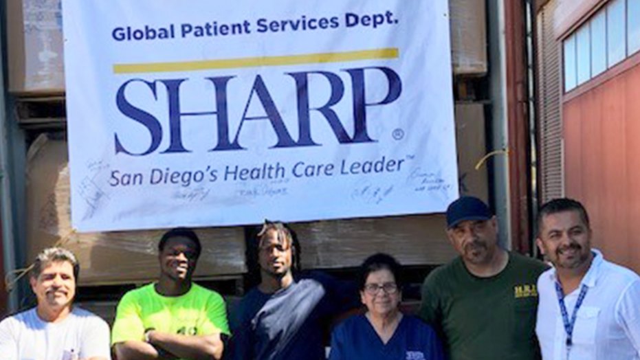 Sharp employees ship office furniture to Saipan