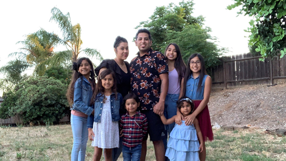 Eli Centeno, at home with his wife, Eva, and their six children