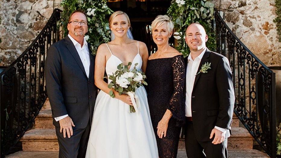 Karen Downtain, with her husband Patrick and kids Molly and Trevor