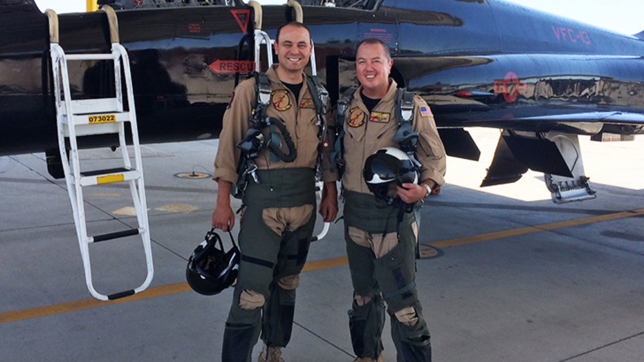 Dr. Joseph Allen (right), a family medicine doctor affiliated with Sharp Community Medical Group, works with tactical pilots in San Diego. He is pictured with CDR David "Martian" Anderson.