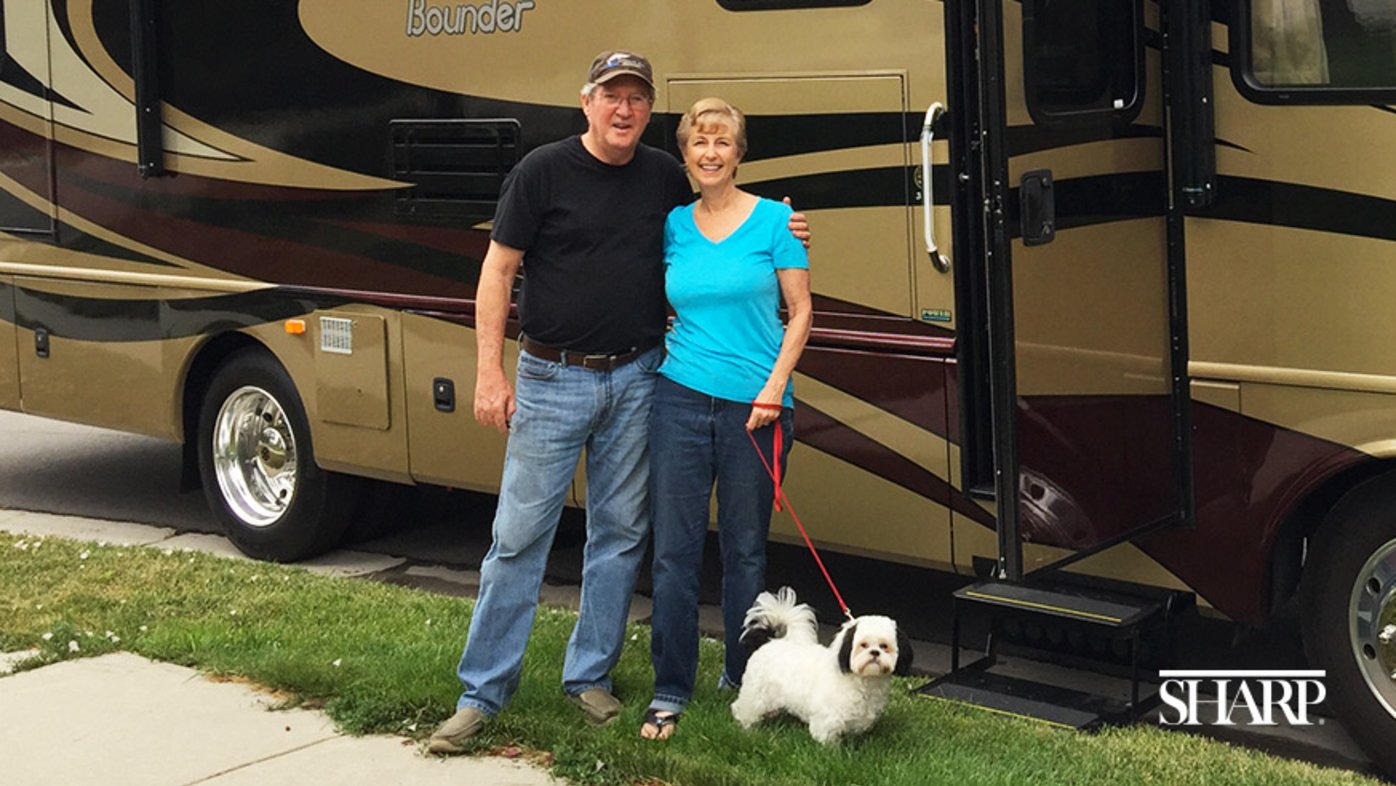 Steve Roberts, with his wife, Pat, and their dog