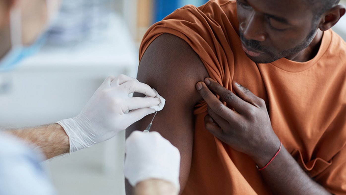 Man getting COVID-19 vaccine