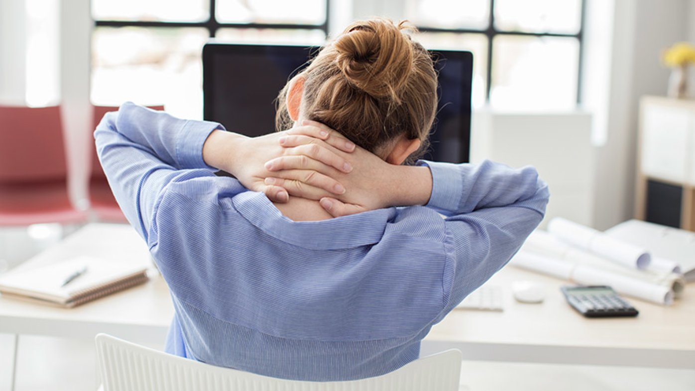 Person at desk experiencing next pain