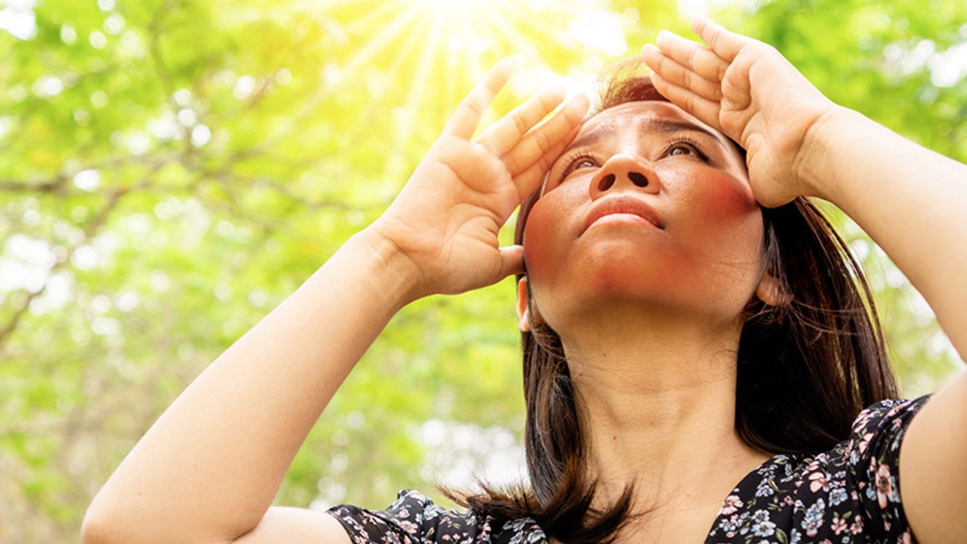 Woman looking at the sun