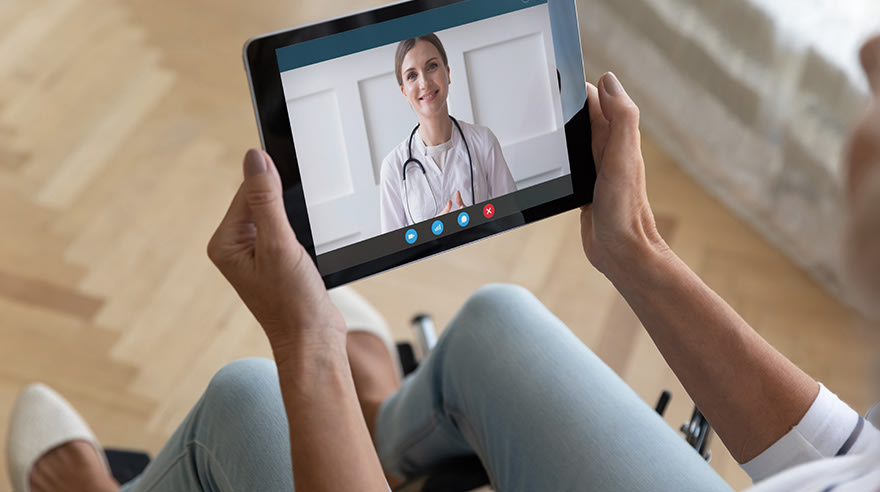 Woman having video visit with her doctor