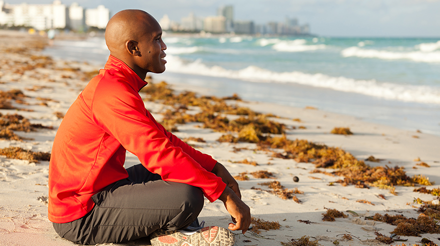 Man sitting at the beach
