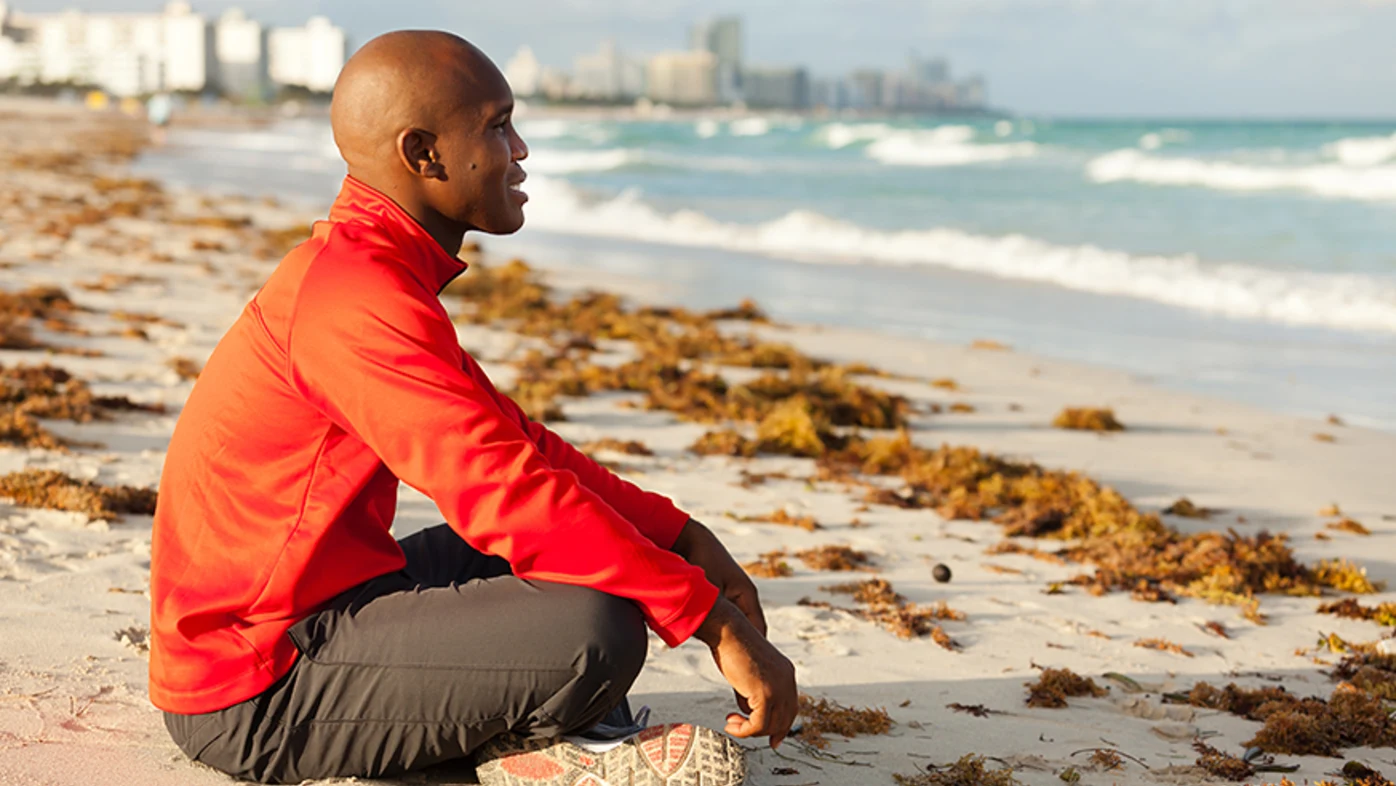 Man sitting at the beach