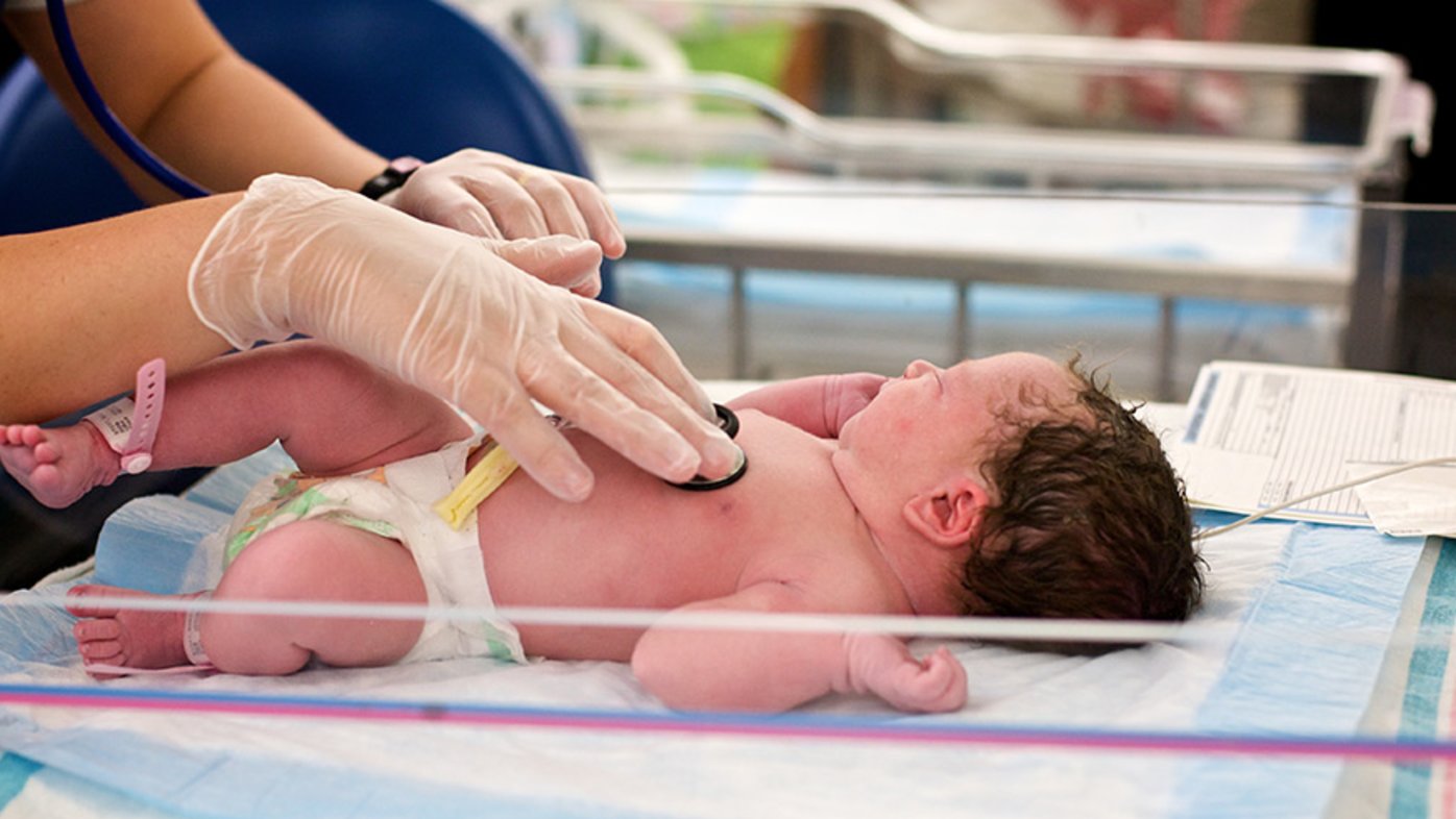 Newborn getting heart screening in hospital