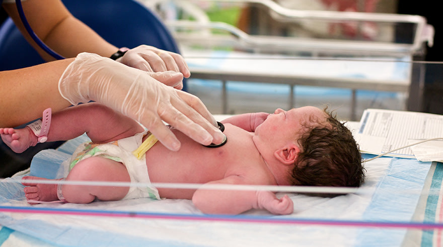 Newborn getting heart screening in hospital