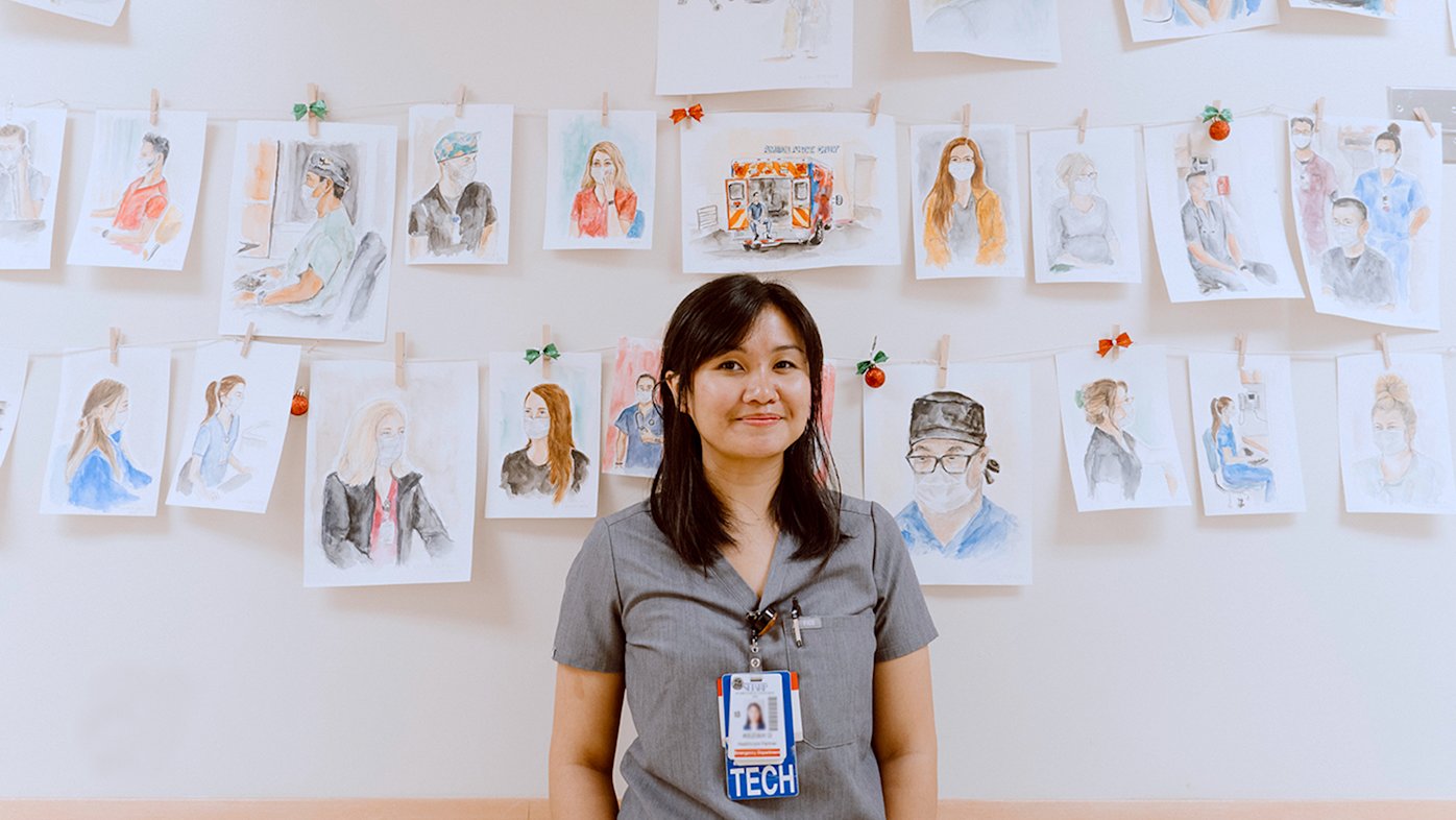 Kezzy Olivar of Sharp Chula Vista displays her portraits