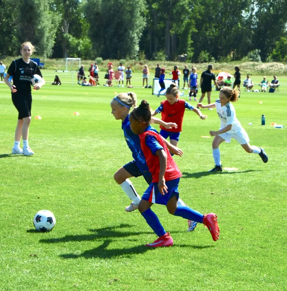 Female coach at We Make Footballers girls programme