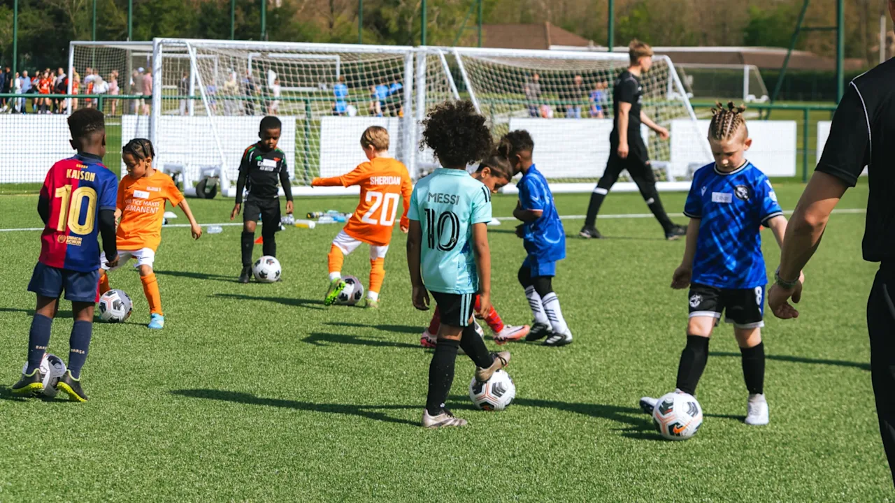 Kids enjoying football together