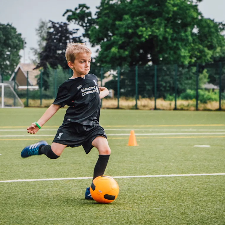 Why is playing football in the holidays important?
