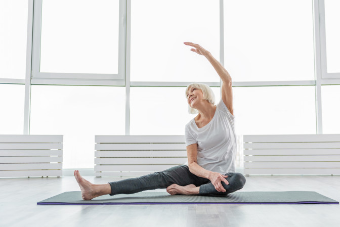 Aging patient practicing active lifestyle yoga