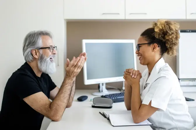 Doctor talking with patient