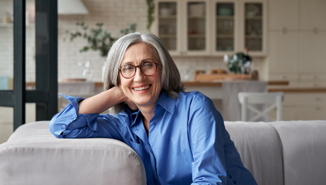 Woman Smiling wearing prescription designer eyeglasses trendy