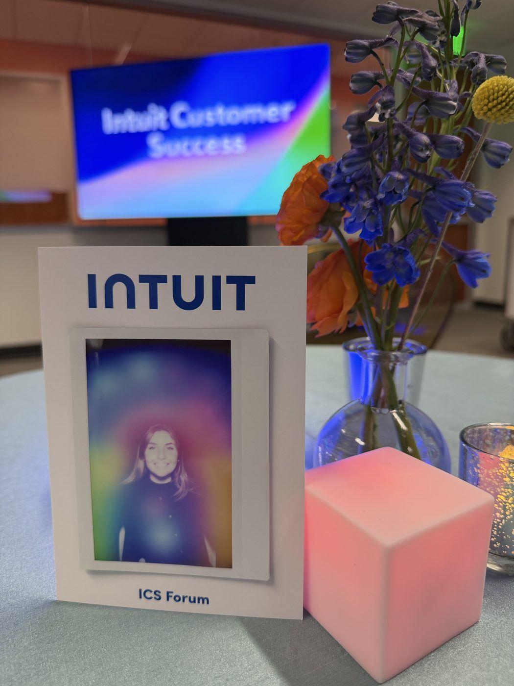A%20custom%20Intuit-branded%20aura%20print%20at%20a%20corporate%20customer%20event.%20Photo%3A%20The%20Aura%20Journey.