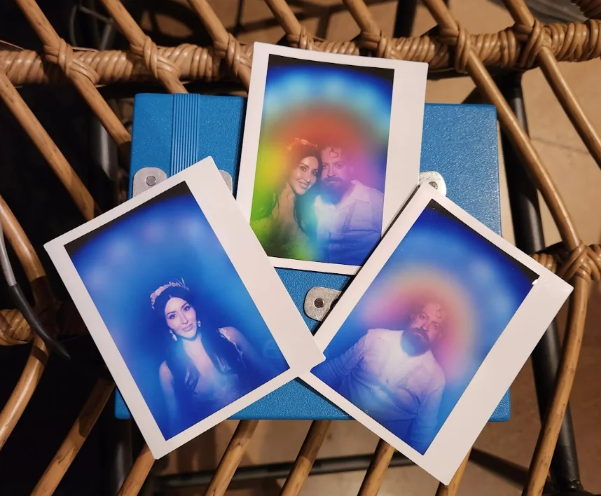 Three%20printed%20aura%20photos%20with%20blue%20and%20violet%20aura%20colors%20on%20a%20woven%20chair