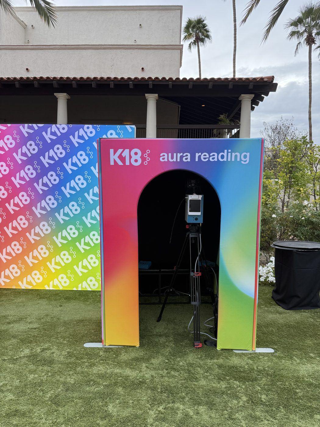 A%20fully%20branded%20K18%20aura%20photography%20arch%20at%20a%20brand%20activation%2C%20September%202026.%20Photo%3A%20The%20Aura%20Journey.