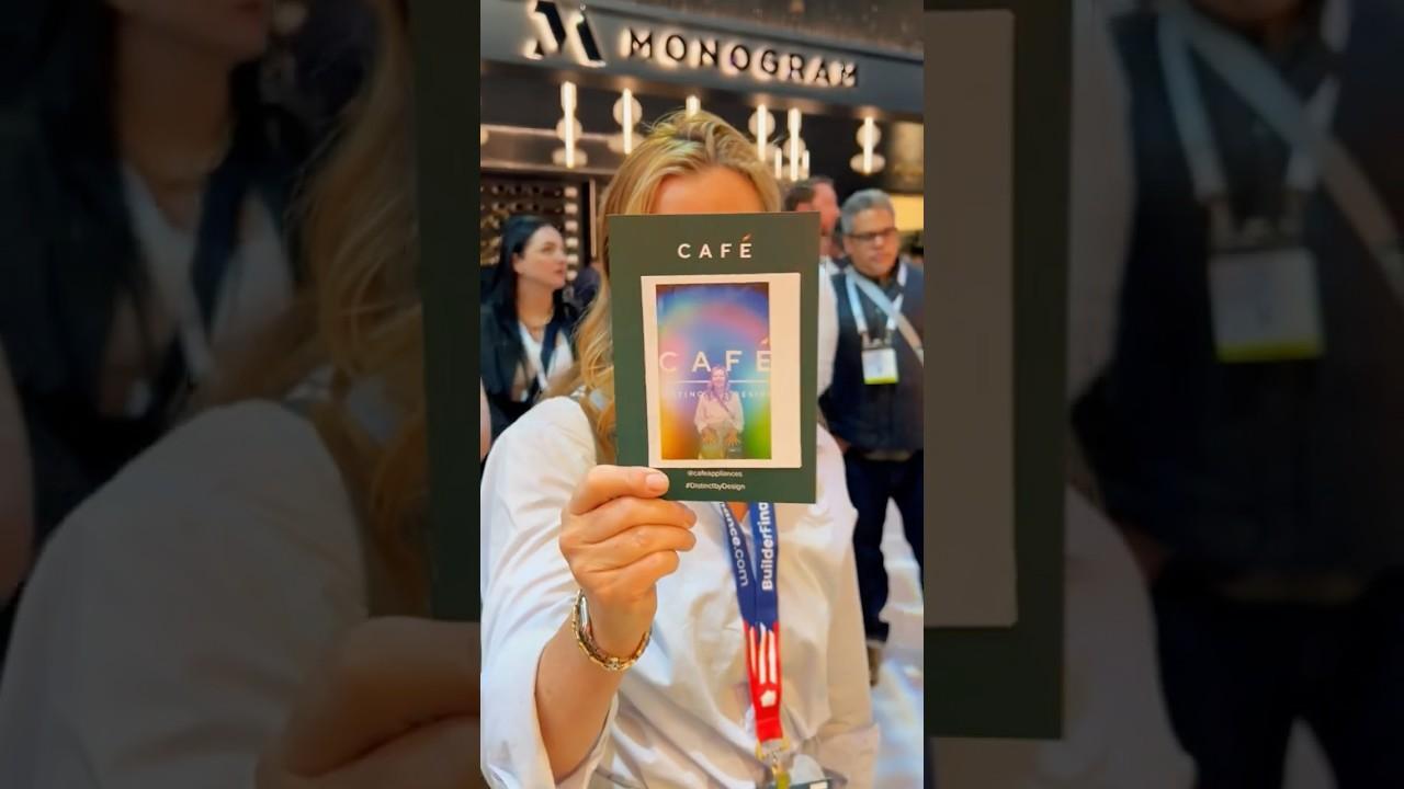 An%20attendee%20holds%20up%20his%20aura%20print%20at%20an%20aura%20photography%20booth%20activation%20at%20the%20NAHB%20International%20Builders%27%20Show%20in%20Las%20Vegas.%20Photo%3A%20The%20Aura%20Journey.