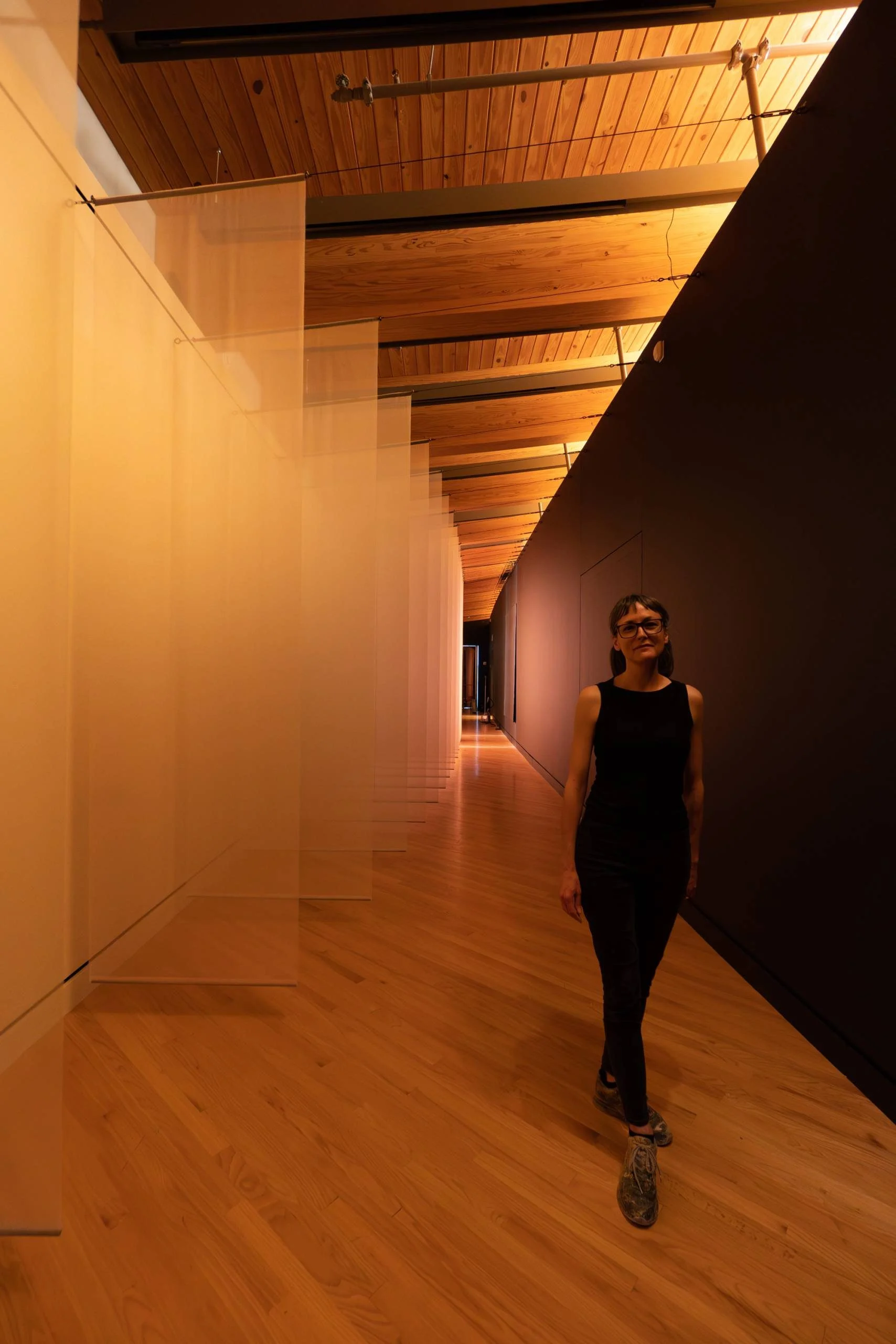 Marie Bannerot McInerney, Trace Me Back, 2023 silk organza, cotton yarn, cement, graphite, dynamic LED light and sonic element 60:00:00. Photo by Tom  McFetridge.