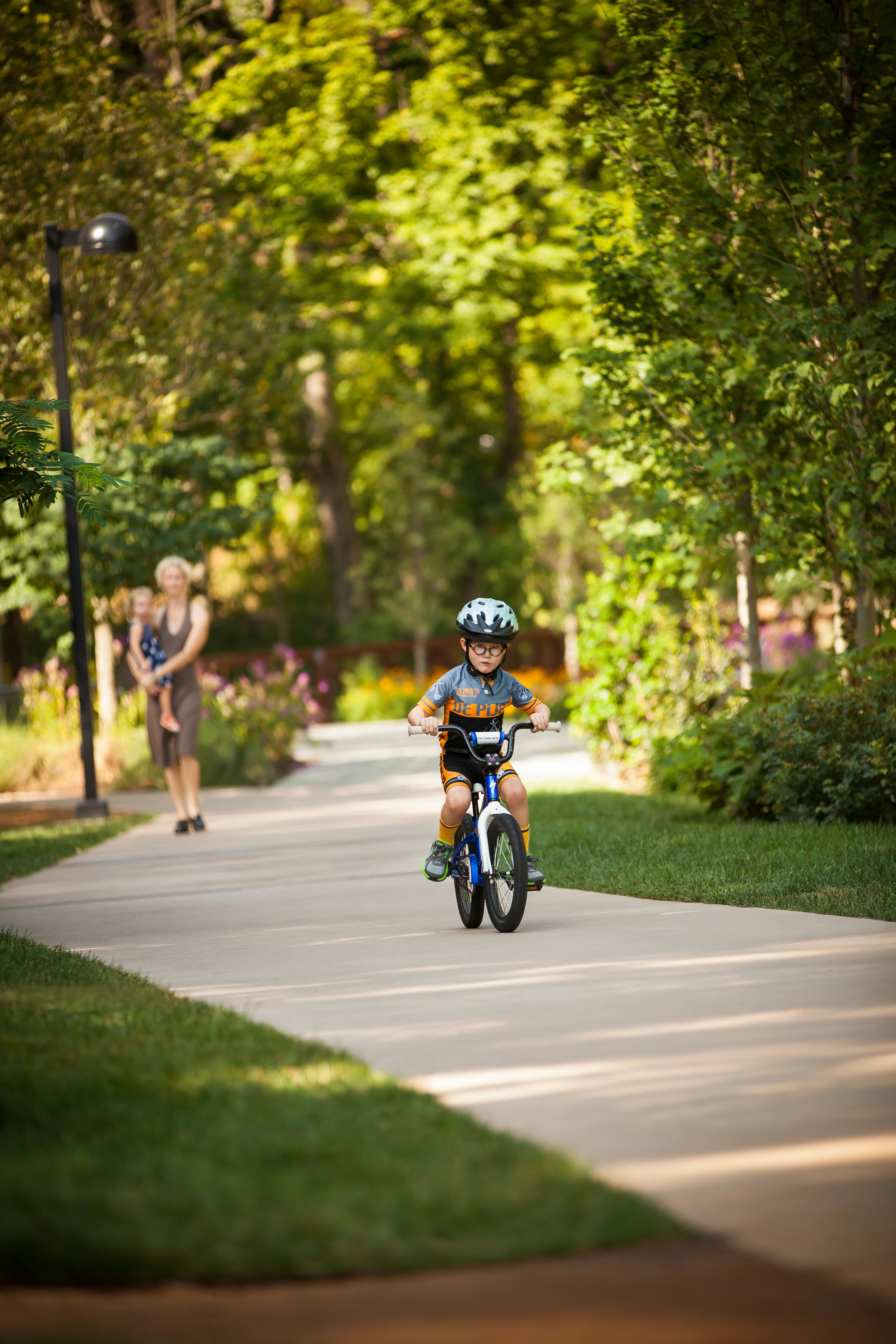 Child on Bike on Paved Crystal Bridges Trail
