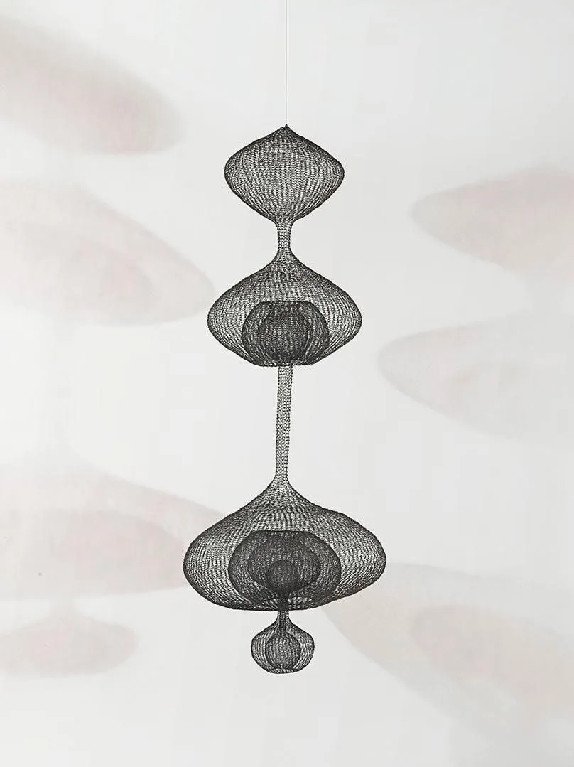 Ruth Asawa (1926 – 2013), Untitled (S.028, Hanging Four-Lobed Continuous Form within a Form), 1960, iron wire, 86 1/2 in. × 32 in. × 32 in. Crystal Bridges Museum of American Art, Bentonville, Arkansas, 2014.8.