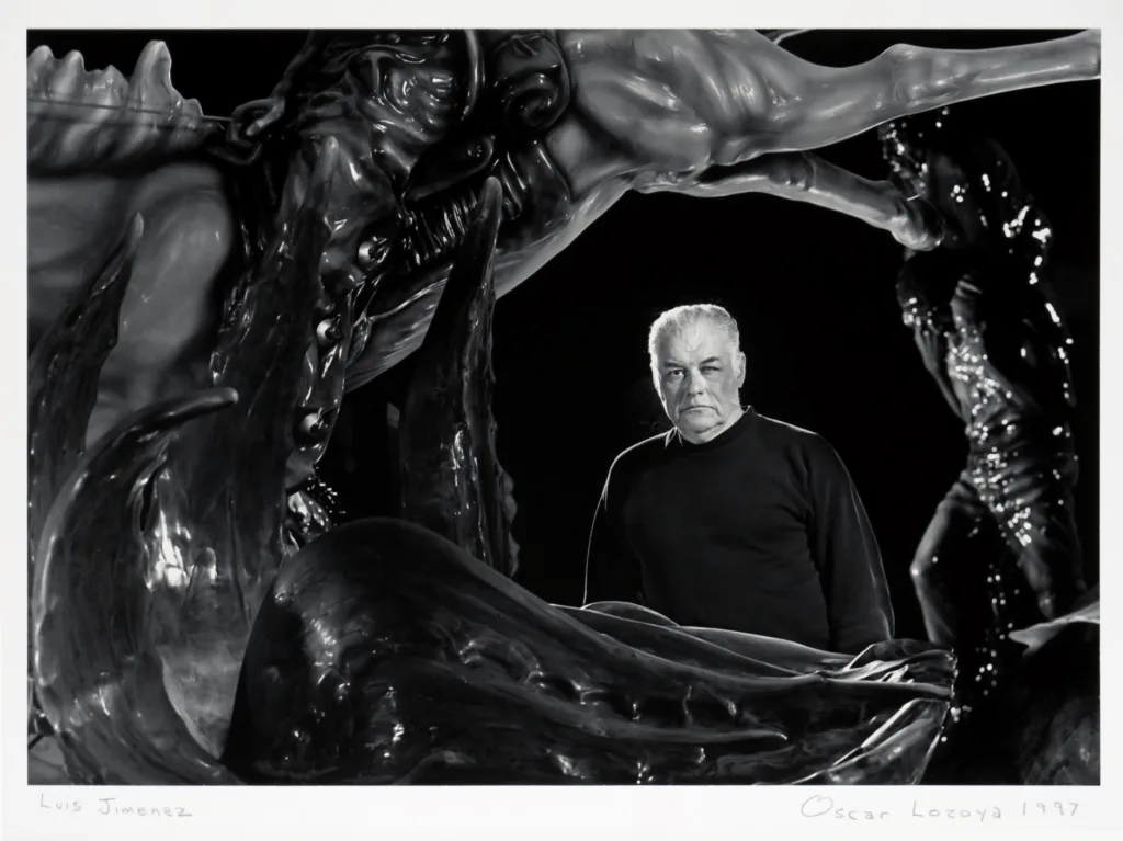 Man Posed Among Abstract Sculptures by Oscar Lozoya 1997