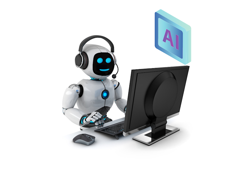 A robot at a computer