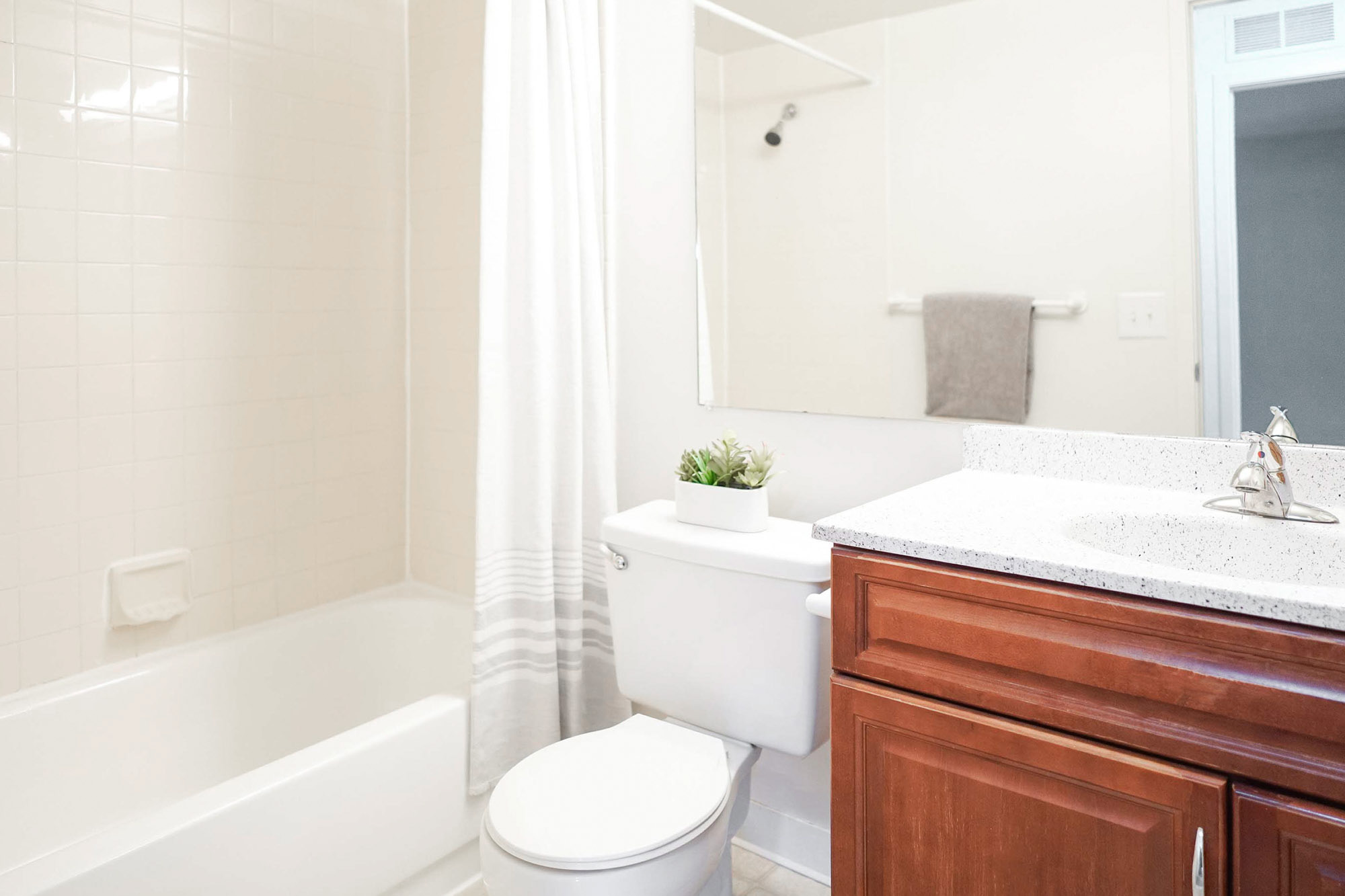 The Cardinal - 1 Bed 1 Bath - Bathroom - Cherry Style Cabinets