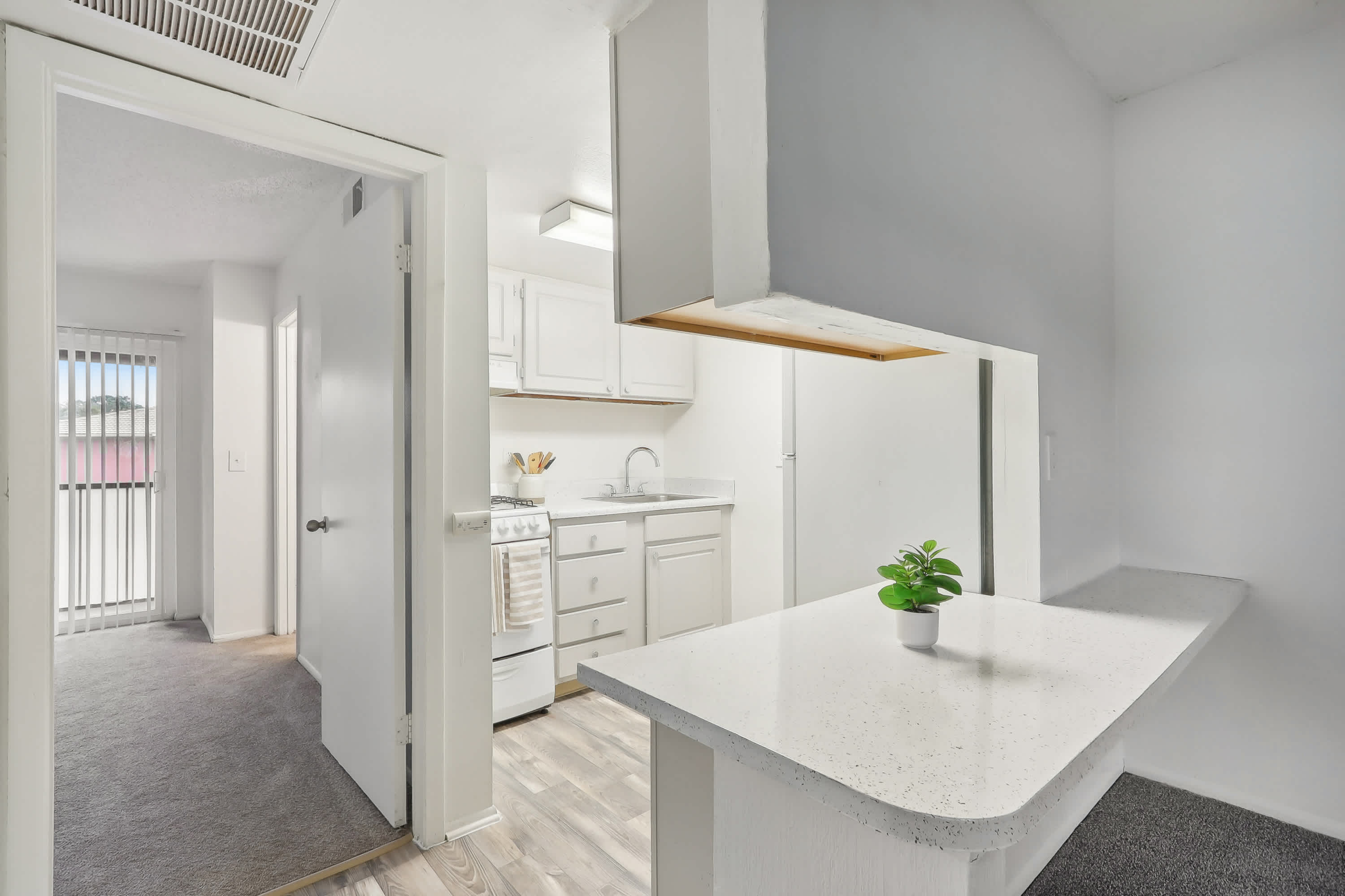 Aqua - 1 Bed 1 Bath - Kitchen - White Cabinet Style