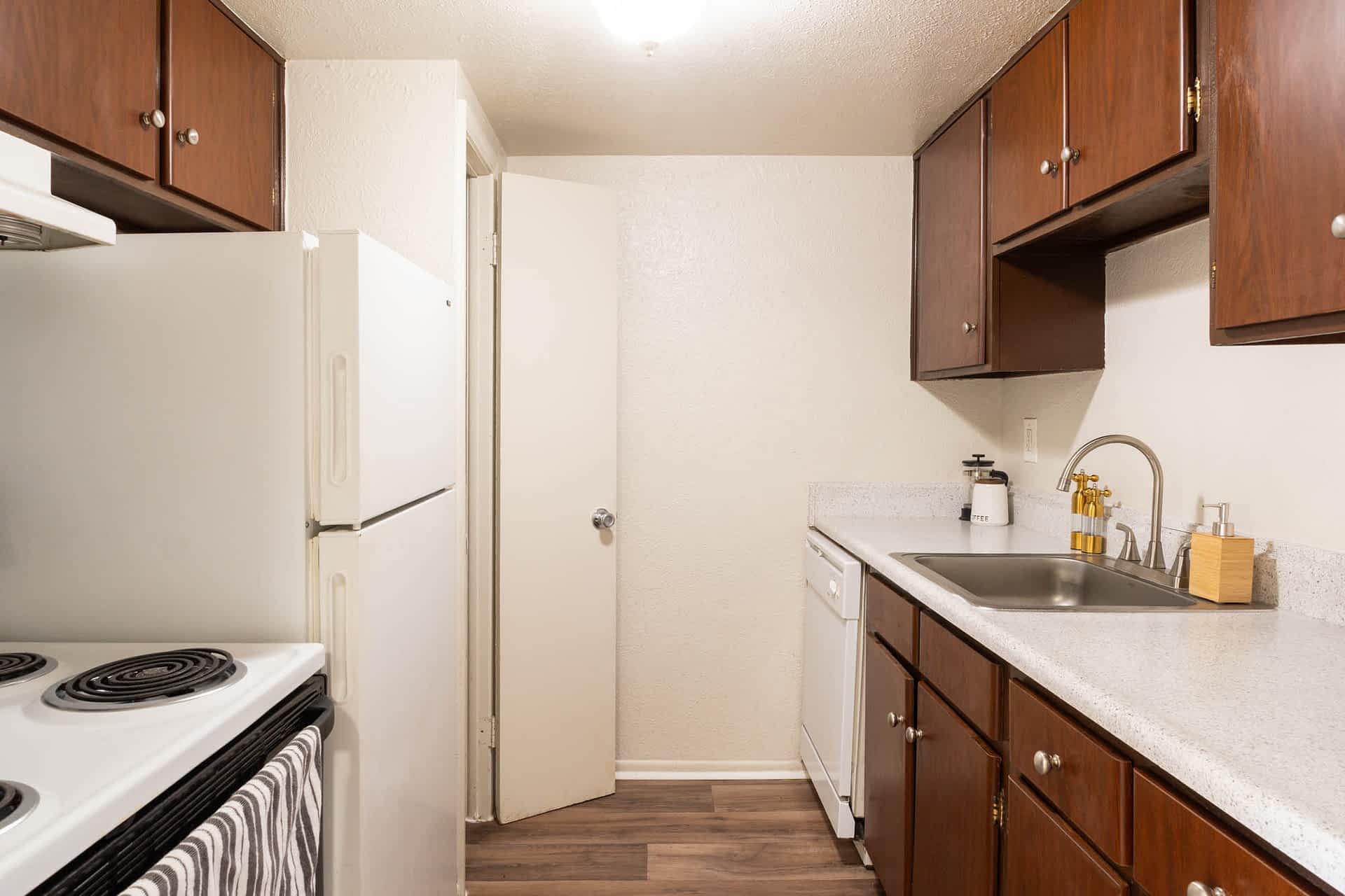 Clague - 2 Bed 1.5 Bath - Kitchen (Brown Cabinets)