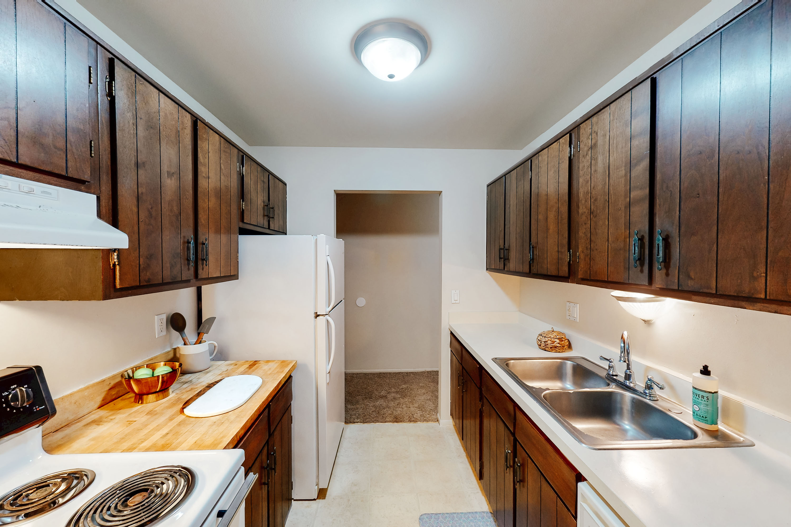 The Au Sable - 2 Bed 1 Bath - Kitchen (Walnut Style Cabinets)