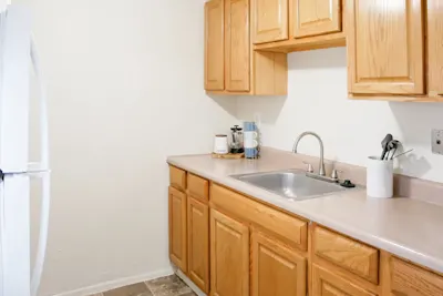 Clague - 2 Bed 1.5 Bath - Kitchen (Honey Oak Cabinets)