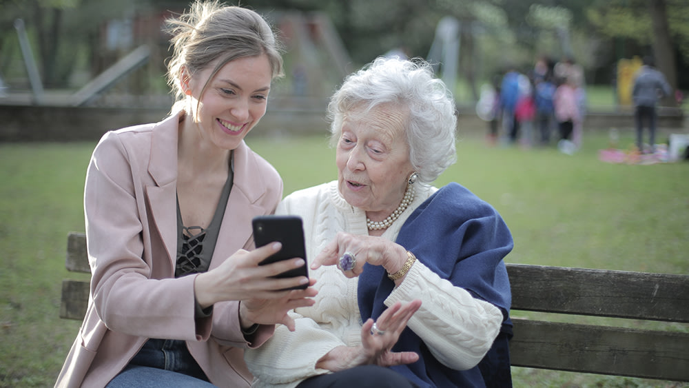 Two women are booking online