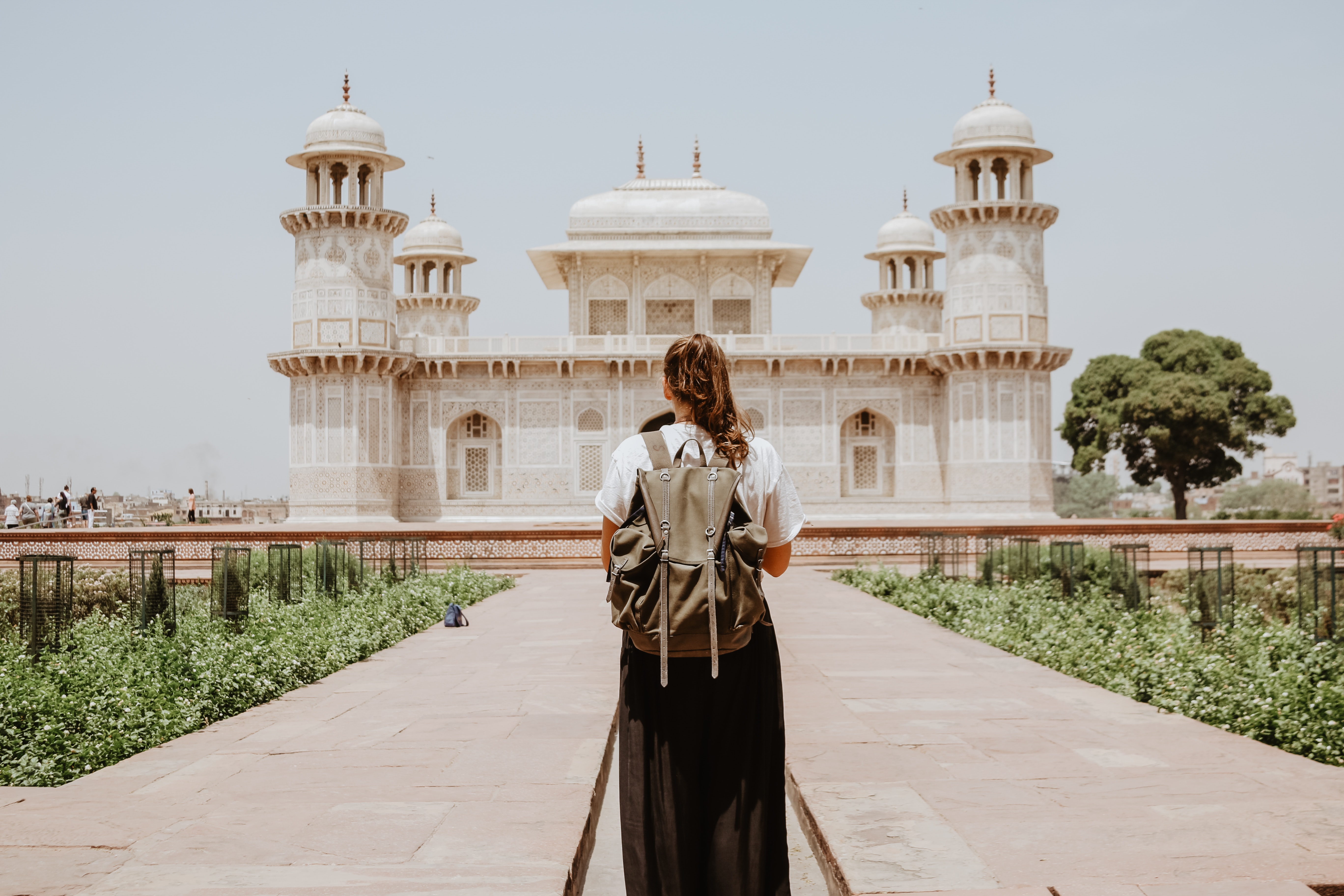 Woman in front of the Taj Mahal. Photo by Ibrahim Rifath.