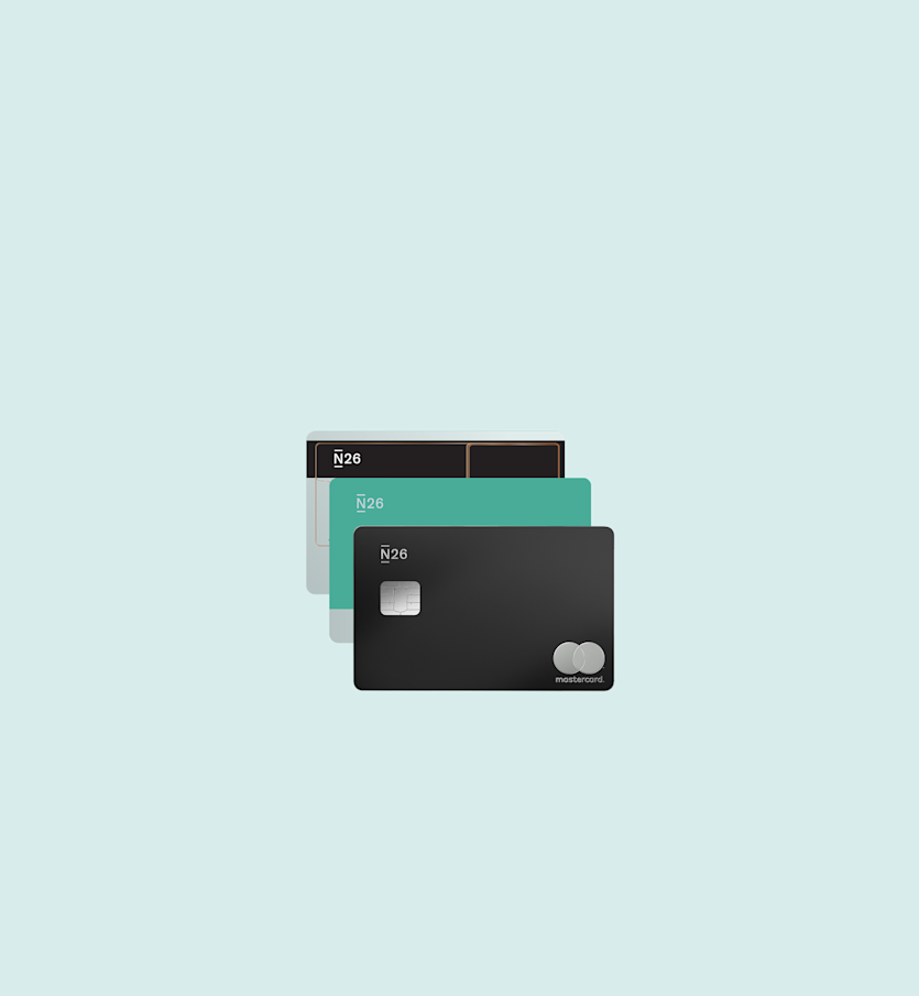 A collection of overlapping smartphone screens shows different features of the N26 app, including a chat message, a main account balance, a person using the app, stocks, and a savings account.