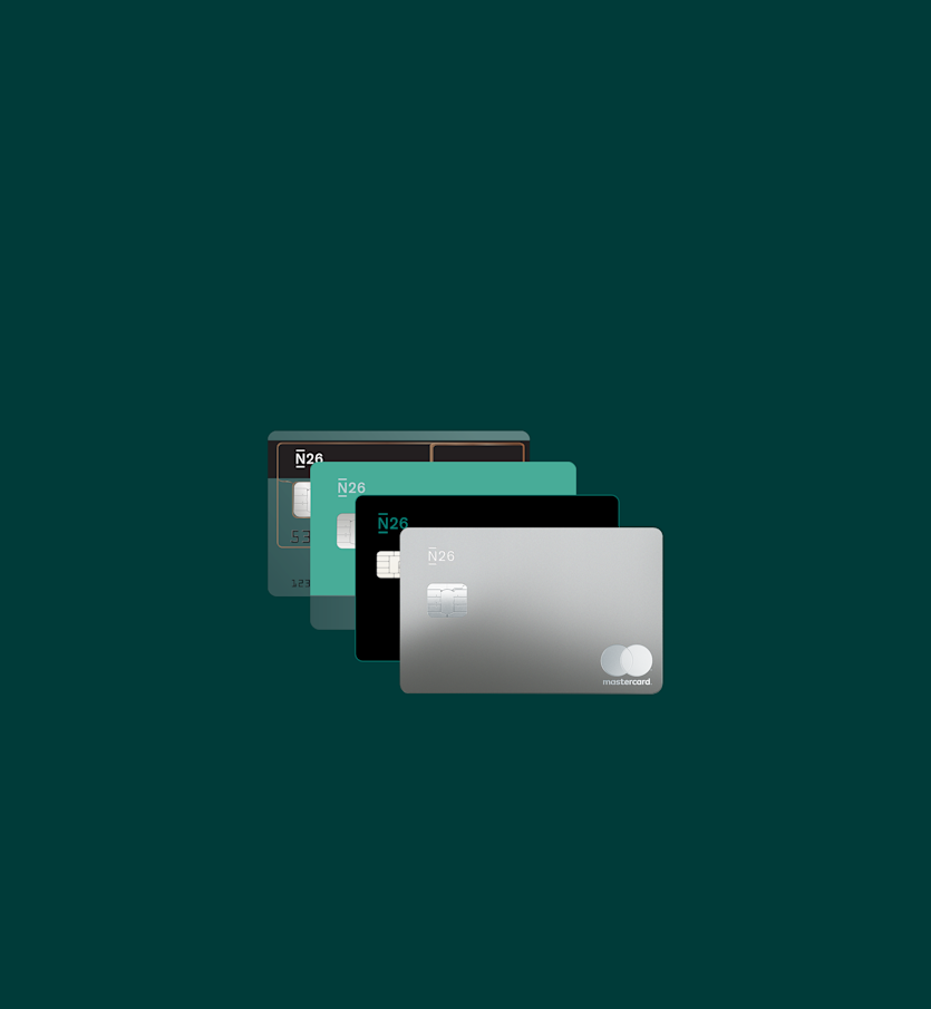 The image shows two N26 bank cards on a teal background. One is a transparent card with a visible chip and black header, placed behind a solid green N26 Mastercard with the Mastercard logo in the bottom right corner.