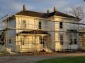 scaffolding in front of a house.