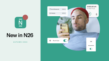 Man checks his phone. New in N26 features.