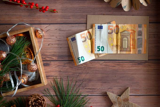 banknotes with Christmas decorations.