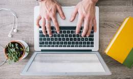 A man registering as a freelancer with a laptop.