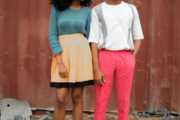 Couple standing next to each other.