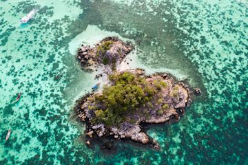 An aerial view of a small, uninhabited island.