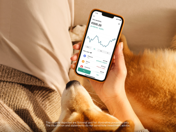 Dog looking at crypto performance on the n26 app.