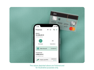 Mobile with the N26 app, next to a transparent card.