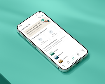 A phone with the screen of N26 app offering Ready-Made Funds to its investment offering.