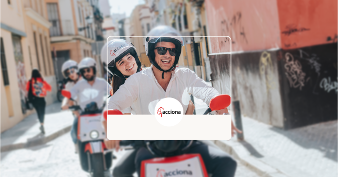 Man and woman riding a motorbike.