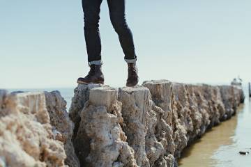 Person walking on a dock.