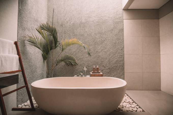 A bathtub in a hotel room.